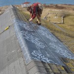 Tietjen Hynes, Island Engineer, making temporary roof repairs